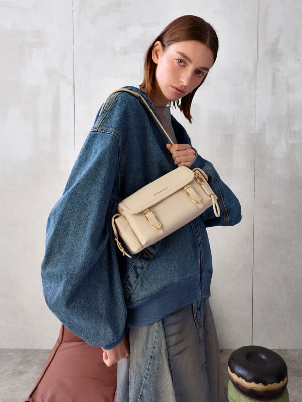 Women’s Levy nylon buckled crossbody bag in dusted oat - CHARLES & KEITH