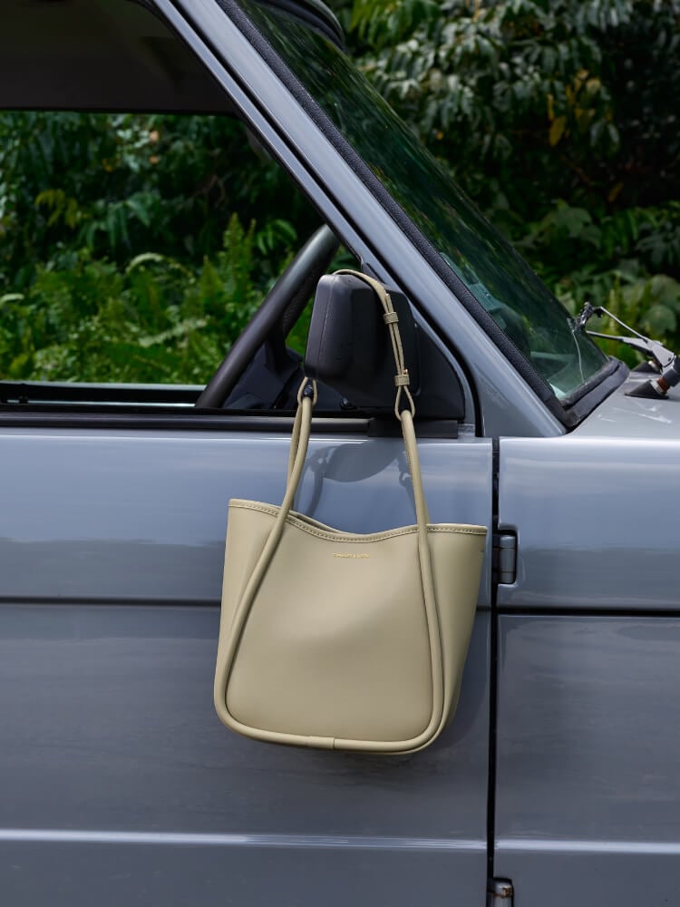 Women’s mini Lyla tubular tote bag in pale olive - CHARLES & KEITH