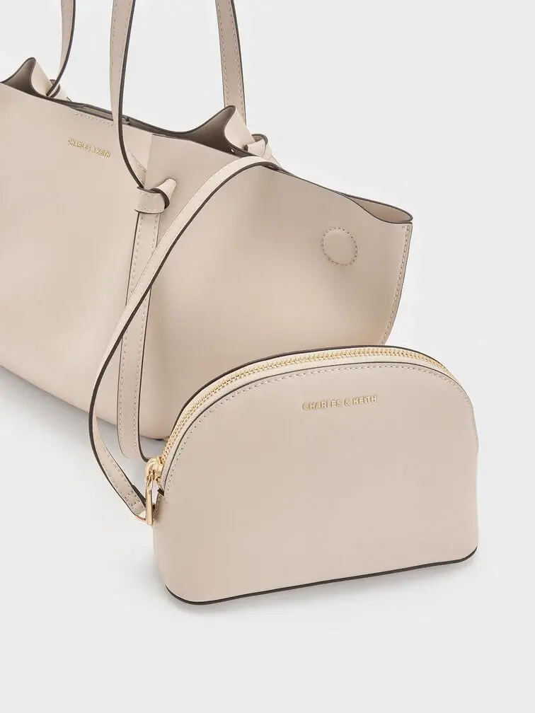 Calla tote bag with a small, zippered pouch attached to the Calla bag