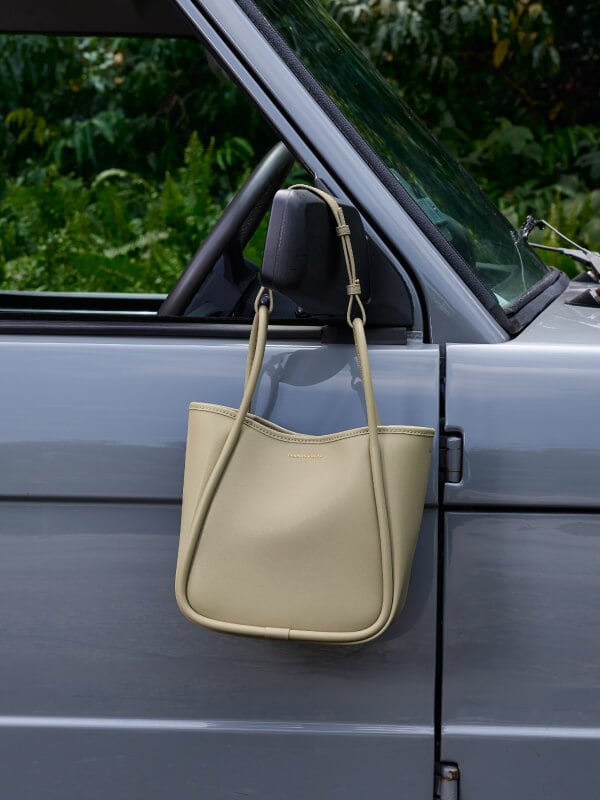 Women’s mini Lyla tubular tote bag in pale olive - CHARLES & KEITH