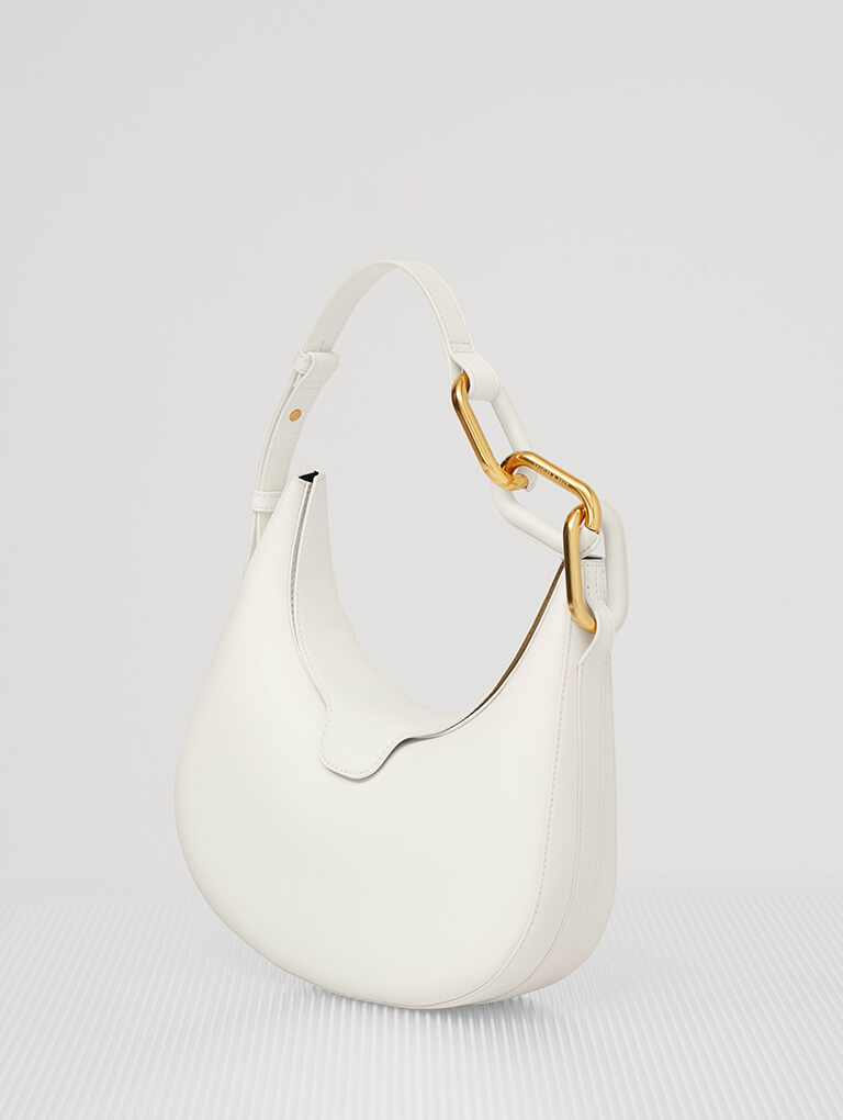 Women’s Kora Metallic-Accent Moon Bag in white - CHARLES & KEITH