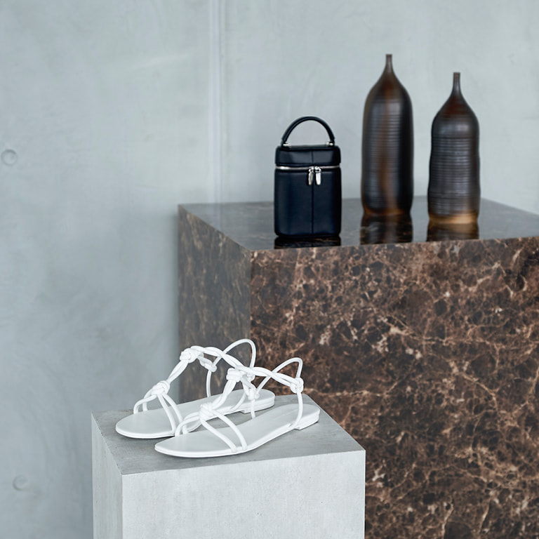 Women’s knotted strap sandals and two-way zip bucket bag in black – CHARLES & KEITH