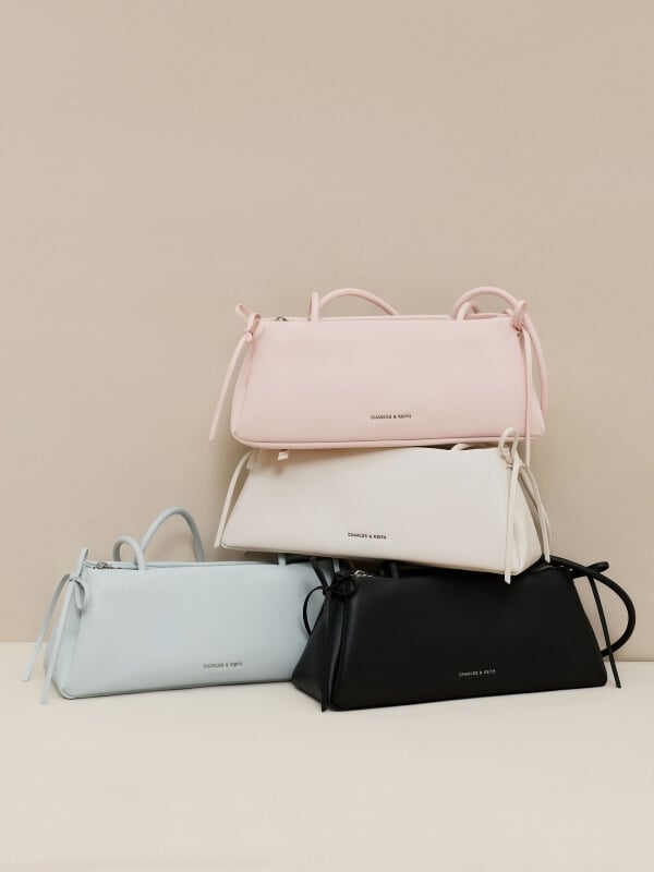 Soft Pink Hazel Bow Elongated Trapeze Shoulder Bag – CHARLES & KEITH TH