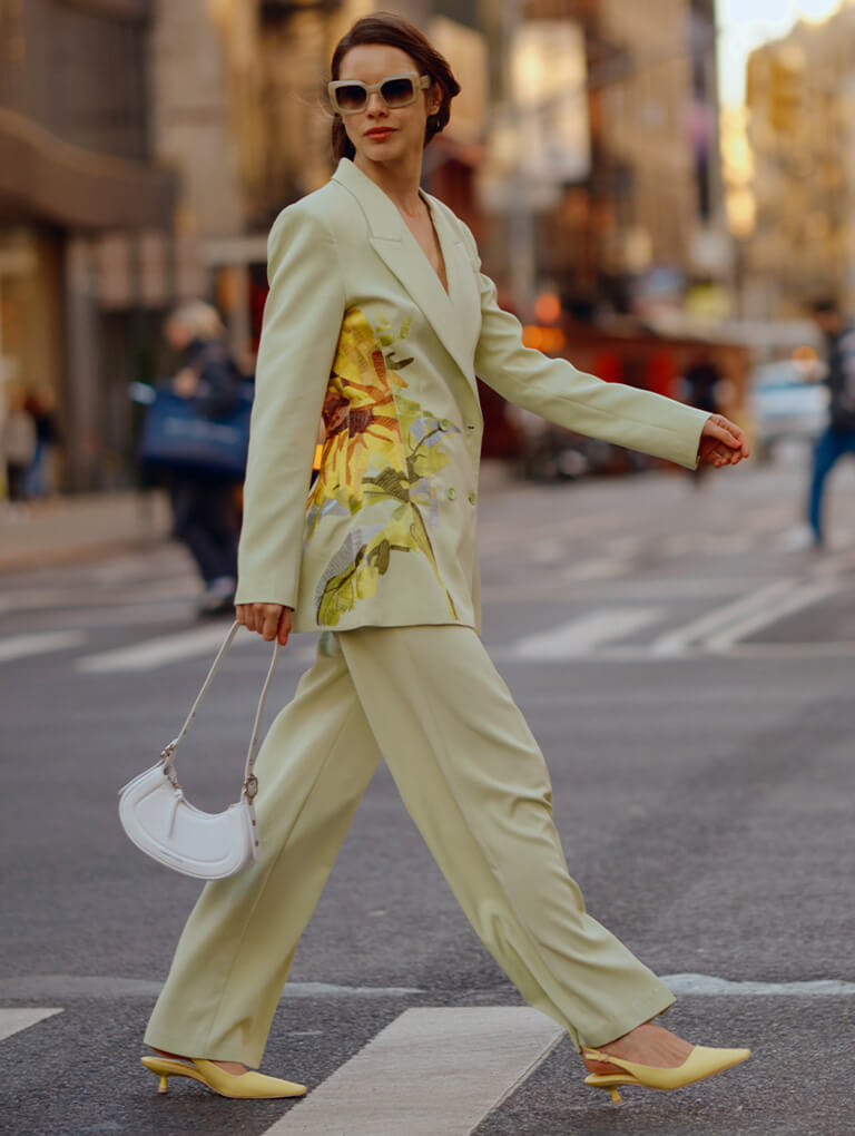 Women’s Petra curved shoulder bag and Vita square-toe slingback pumps in yellow, as seen on Marina Ingvarsson - CHARLES & KEITH
