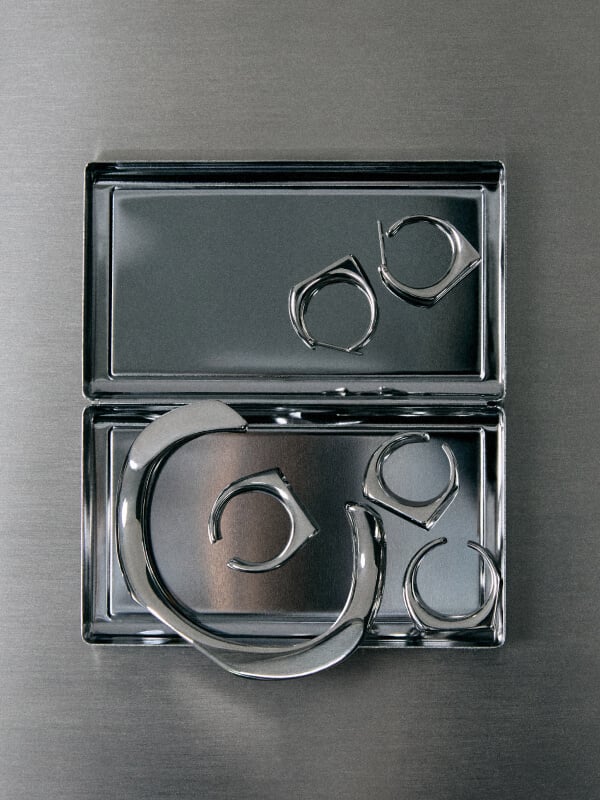 Women’s Gabine sculptural open ring, Gabine sculptural hoop earrings and Gabine sculptural cuff bracelet in silver - CHARLES & KEITH