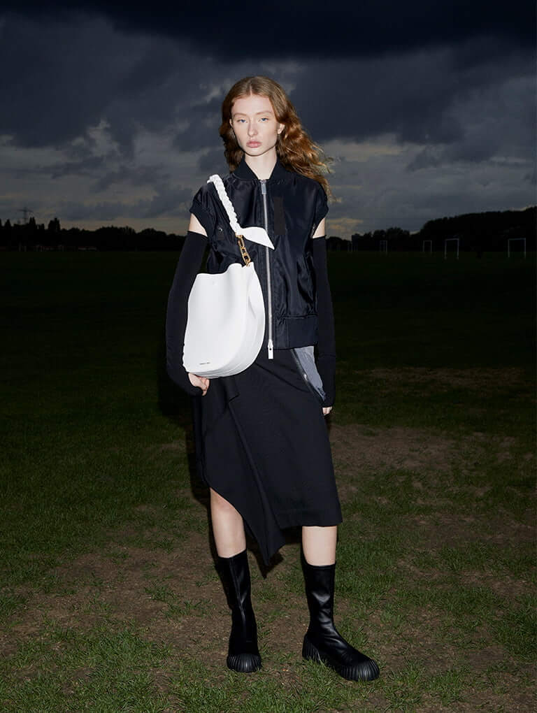 Cleona Braided Handle Bag in white and Adrian Chunky Sole Calf Boots in black - CHARLES & KEITH
