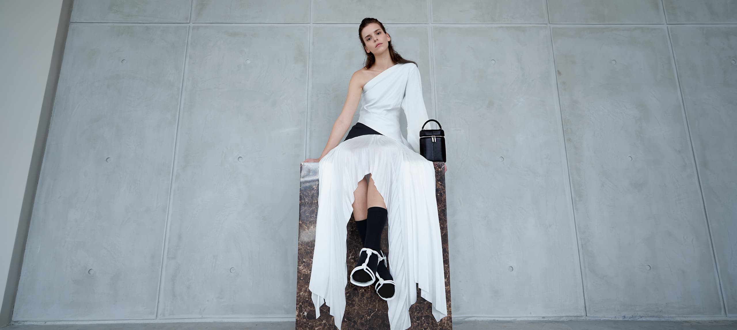 Women’s knotted strap sandals in white and two-way zip bucket bag – CHARLES & KEITH
