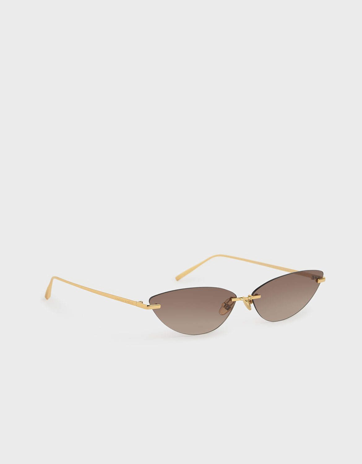 Women’s brown rimless cat-eye sunglasses – CHARLES & KEITH