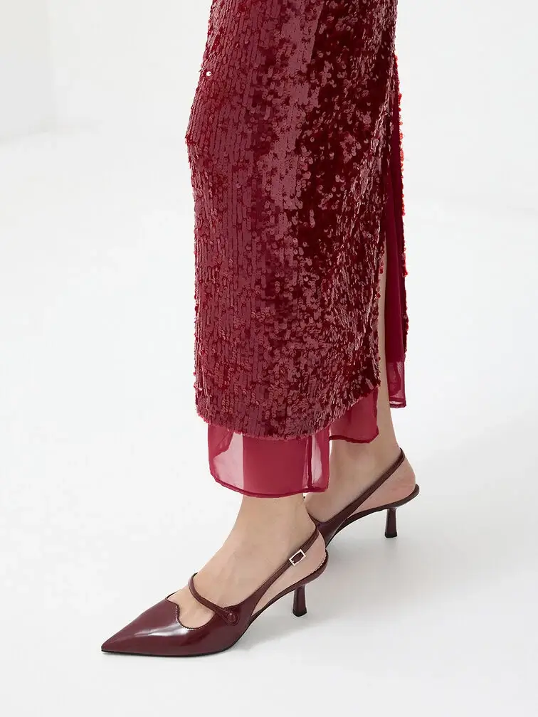 Burgundy slingbacks styled with a red dress.
