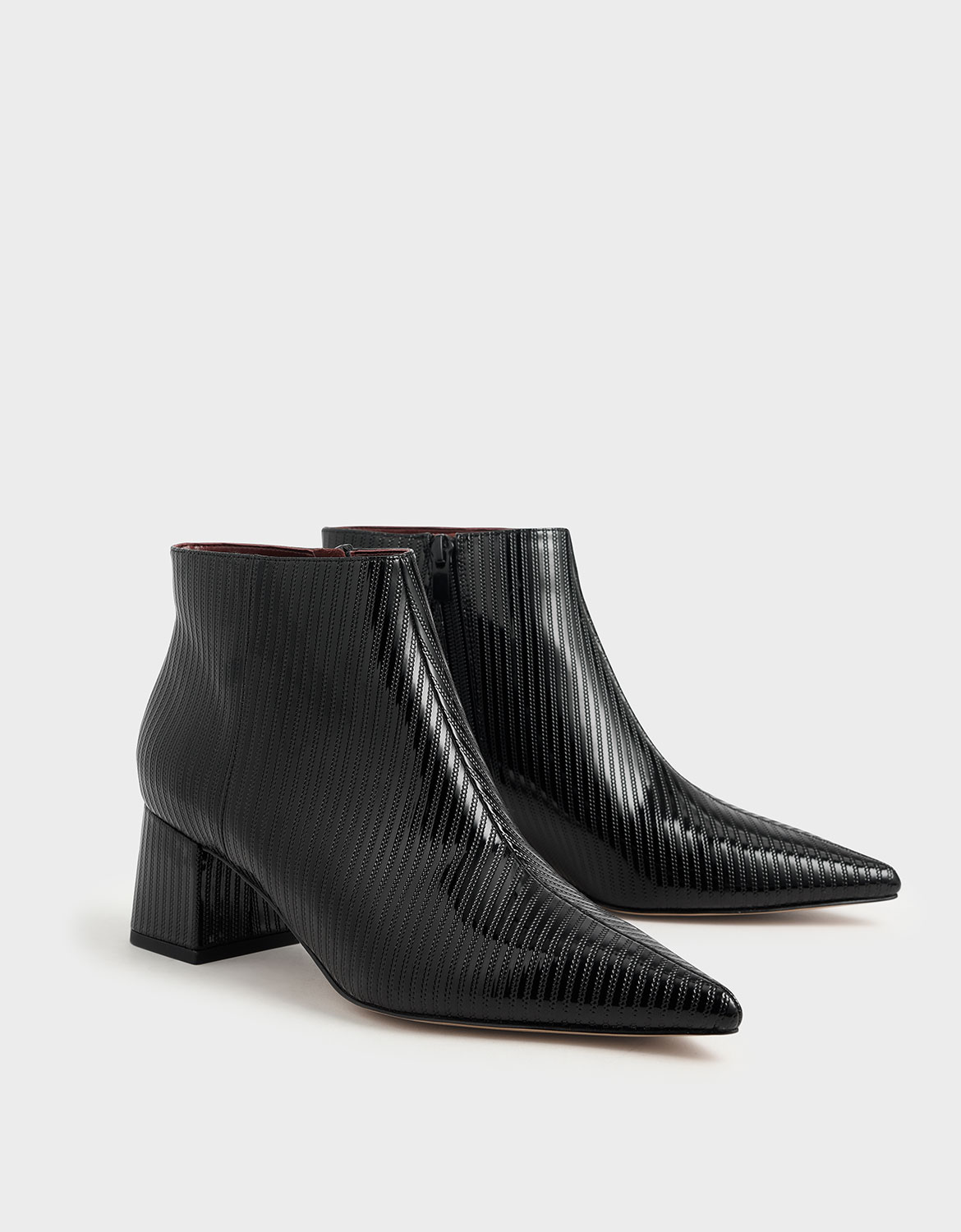 Women’s black textured patent ankle boots – CHARLES & KEITH