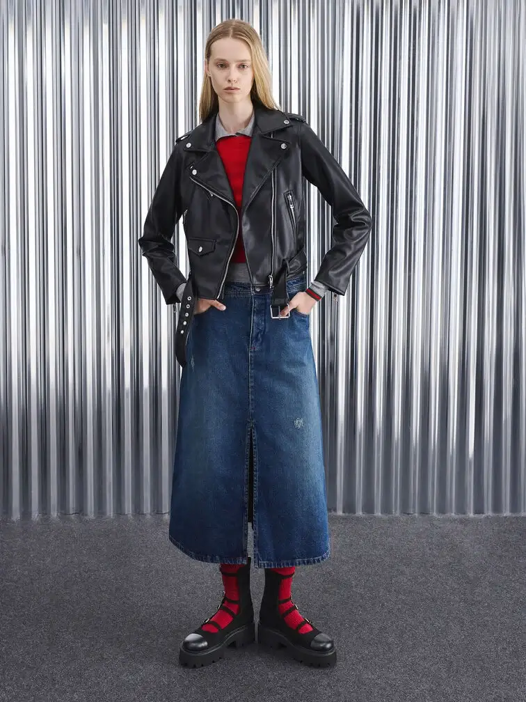 Versatile black chunky calf boots, styled with a leather jacket, denim skirt and red socks.