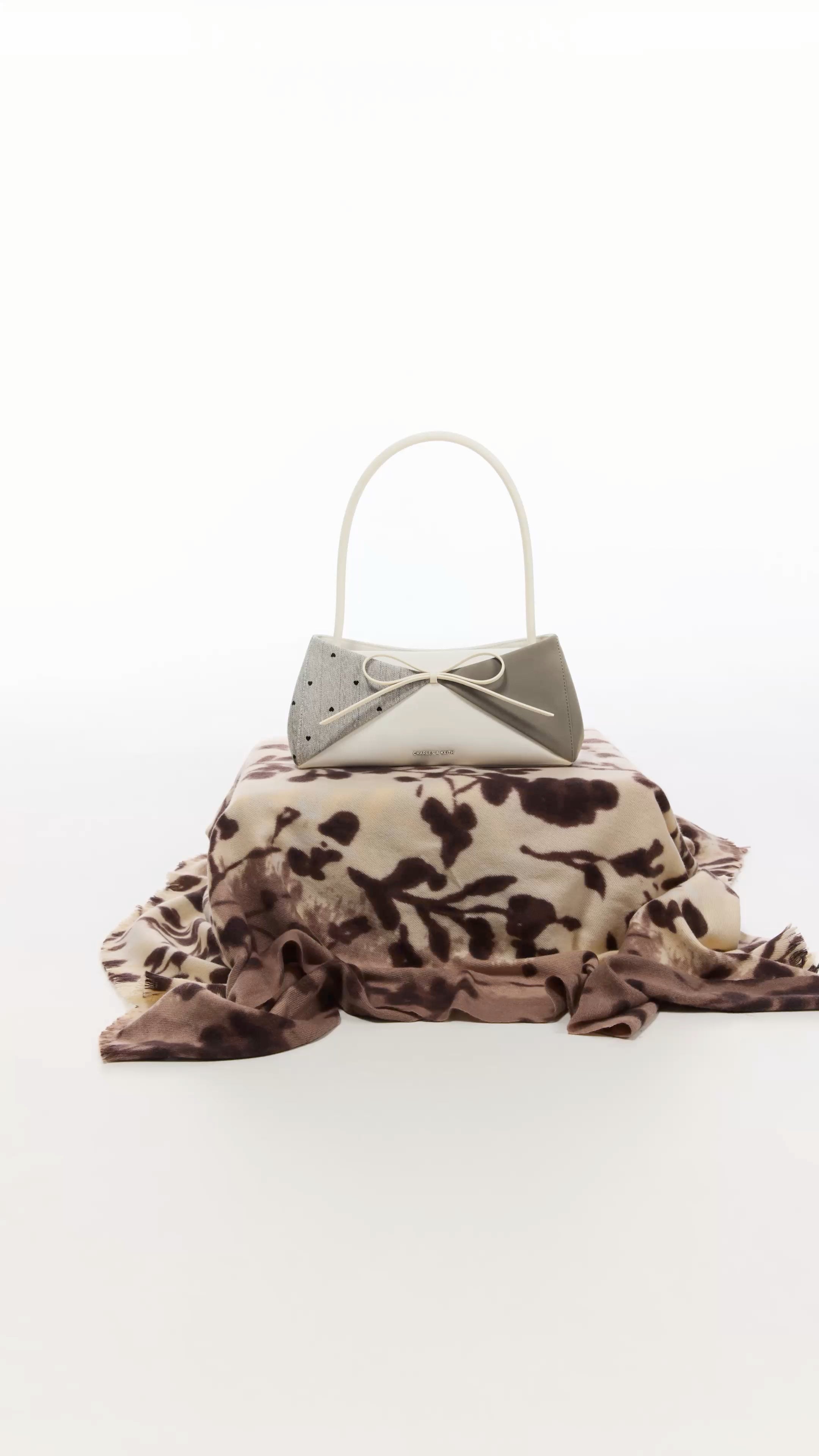 Women’s Hazel striped bow panelled top handle bag and  Hazel striped bow panelled shoulder bag - CHARLES & KEITH