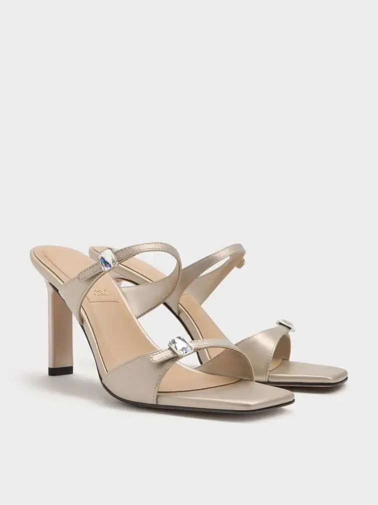 Open-toe heeled sandals will complement an A-line dress perfectly.