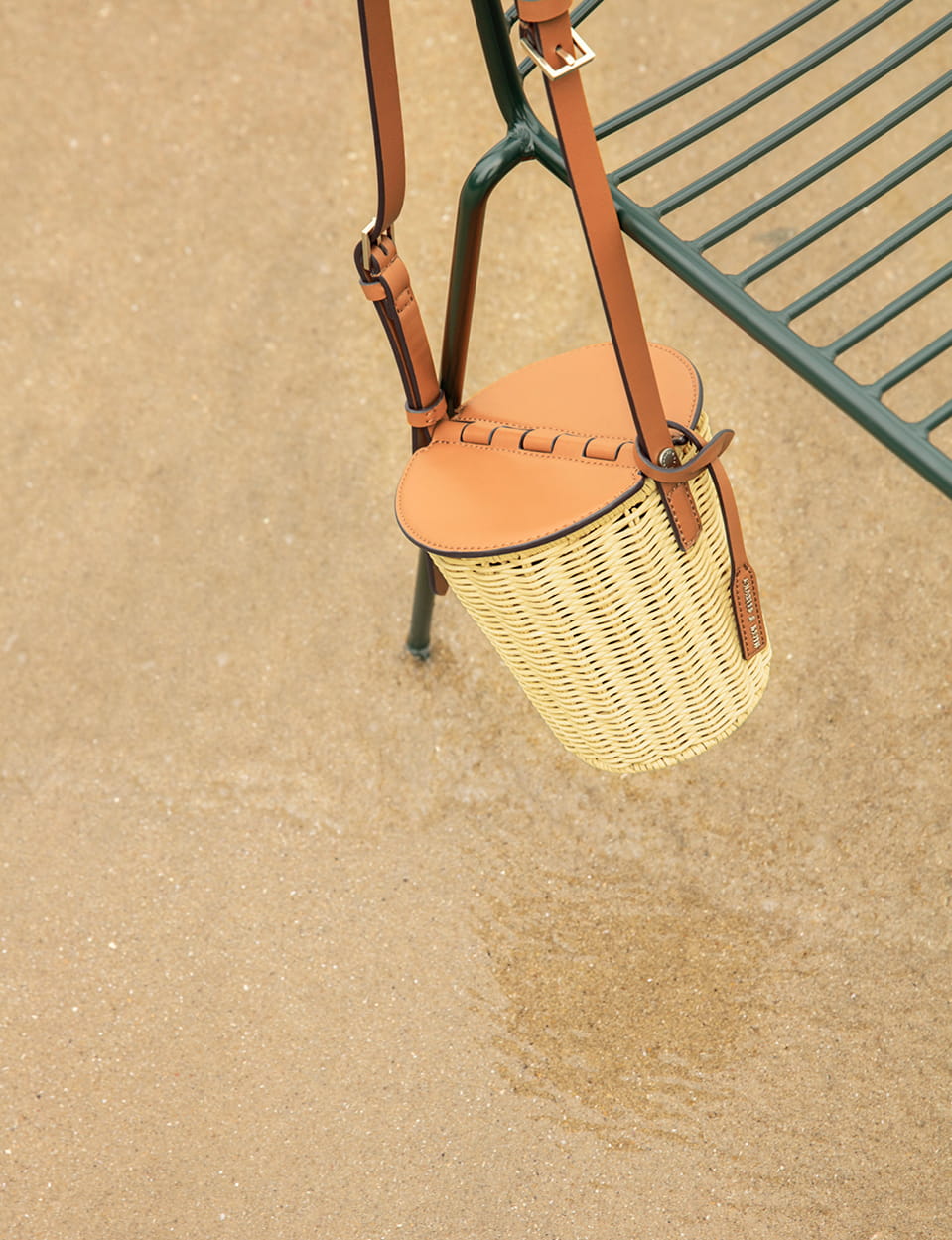 Women’s rattan cylindrical crossbody bag close up – CHARLES & KEITH