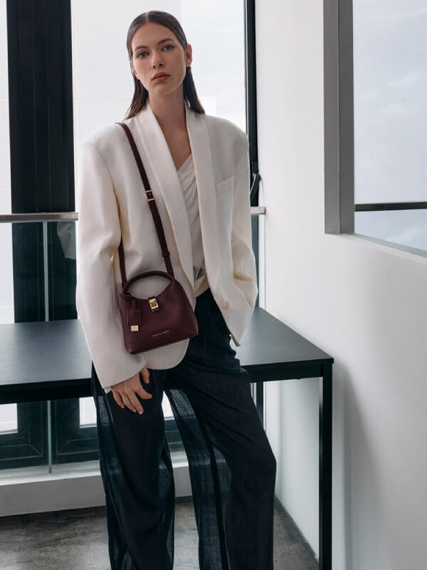Women’s mini Chance turn-lock bucket bag - CHARLES & KEITH