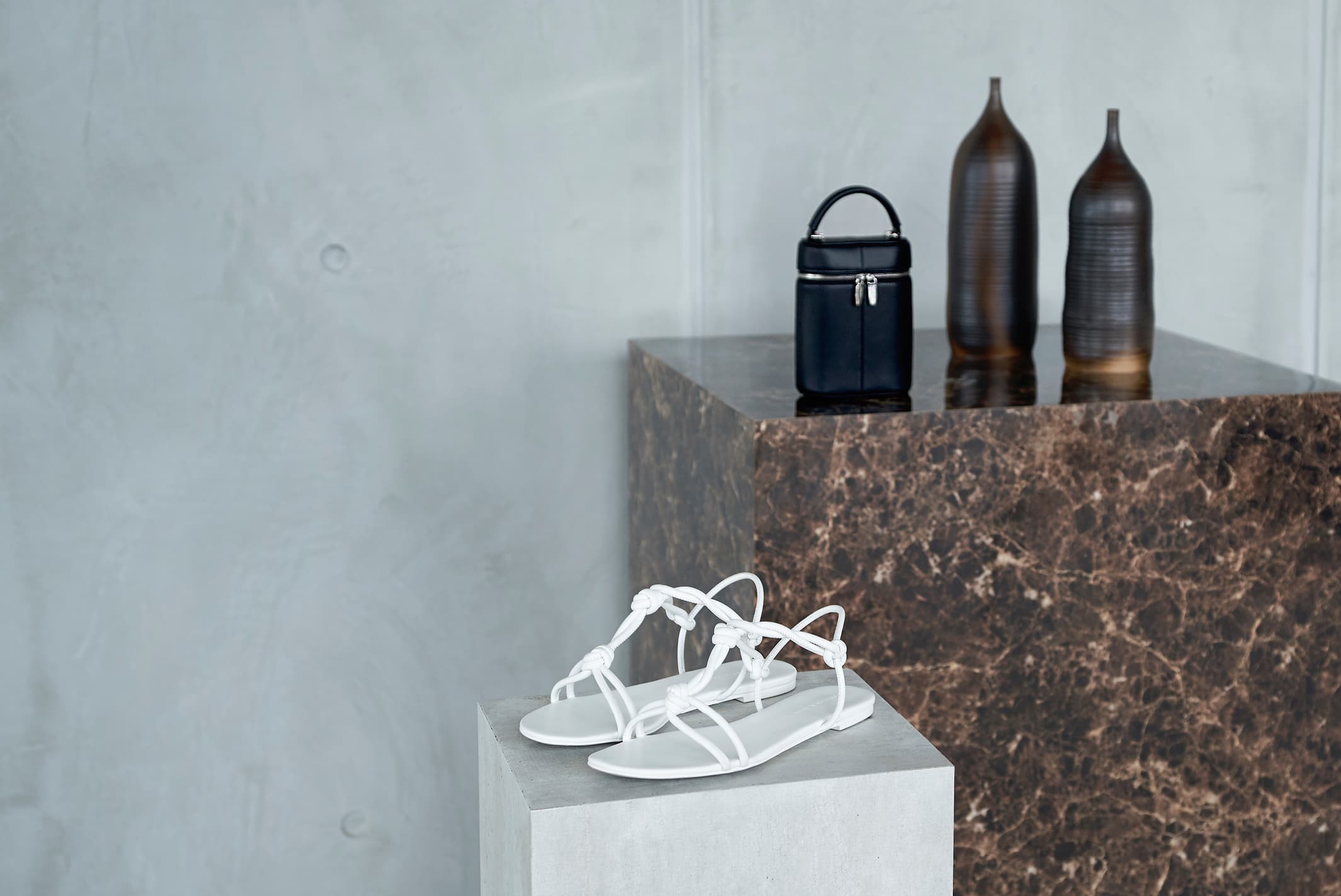 Women’s knotted strap sandals and two-way zip bucket bag in black – CHARLES & KEITH
