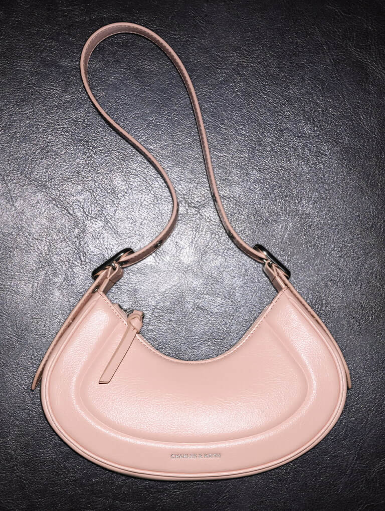 Petra Curved Shoulder Bag in pink - CHARLES & KEITH