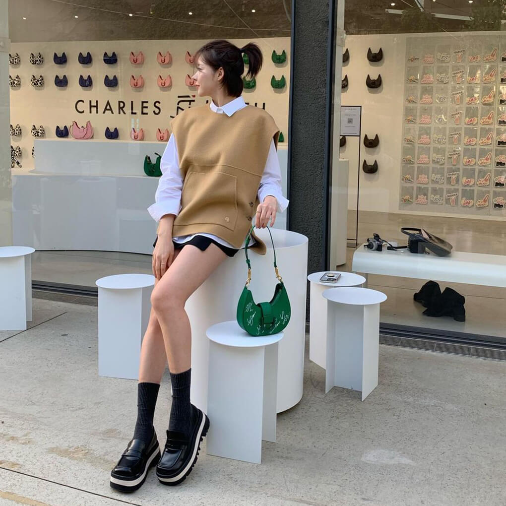 ITZY Rainier Chunky Platform Penny Loafers in black and ITZY Gabine Belted Hobo Bag in green - CHARLES & KEITH