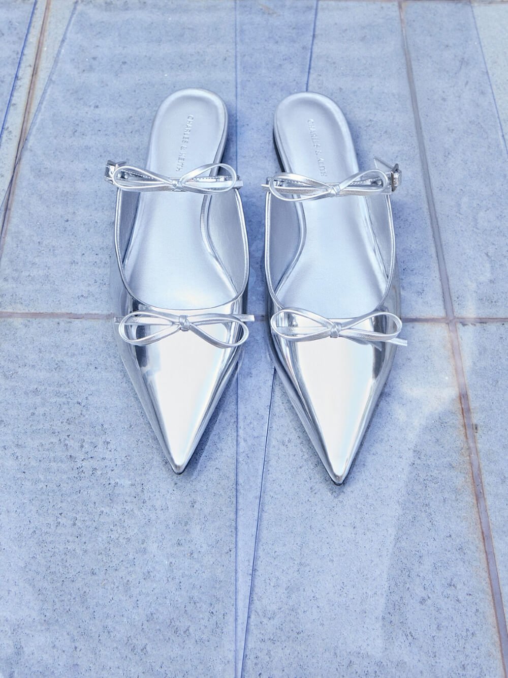 Women’s metallic double-bow pointed-toe mules in silver - CHARLES & KEITH