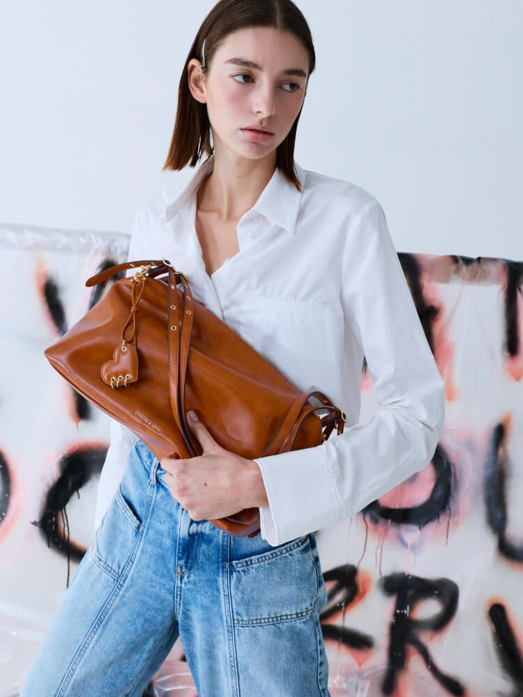 Women’s distressed tan Rey slouchy shoulder bag - CHARLES & KEITH