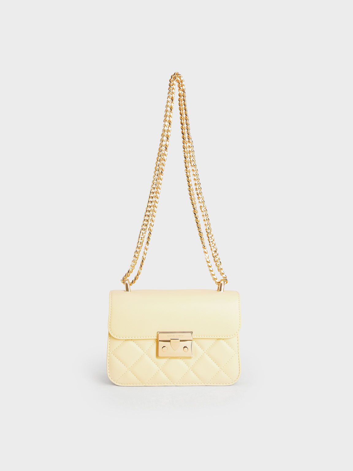 Charles and keith push online lock chain sling bag