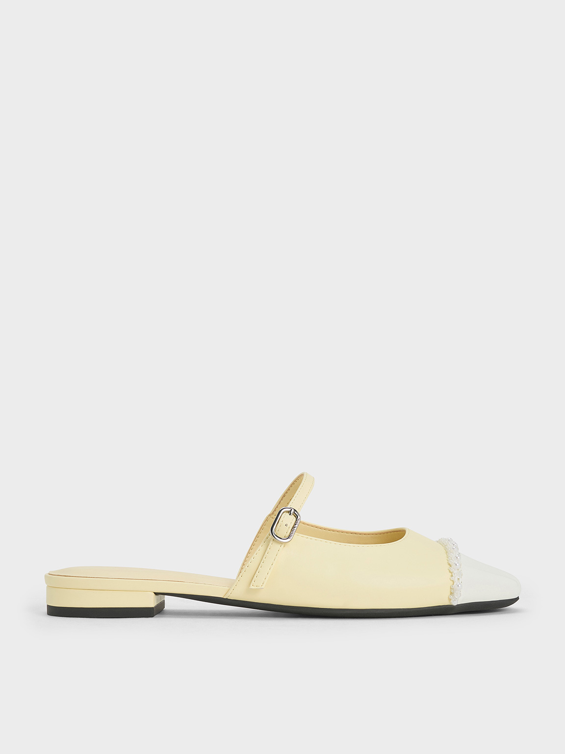 Butter Pearl-Embellished Cap-Toe Flat Mules - CHARLES & KEITH TH