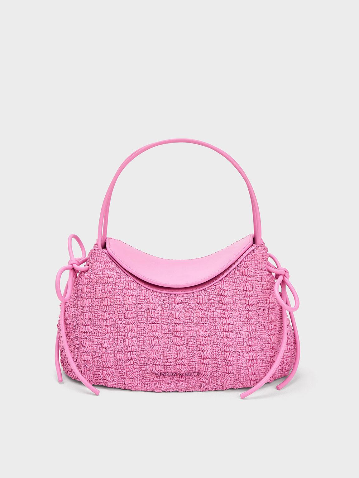 Pink handbag with clearance bow